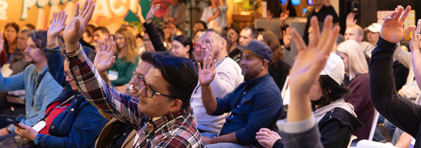 People putting their hands up